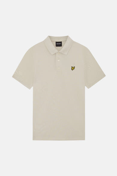Polo beige à manches courtes de LYLE & SCOTT, avec logo jaune brodé.
