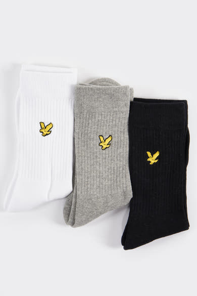 Chaussettes blanches de LYLE & SCOTT, grises et noires, avec logo brodé sur le côté.