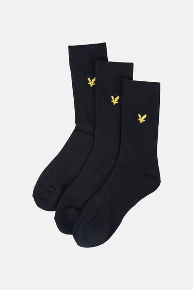 Zwarte sokken van LYLE & SCOTT, met geborduurd gouden adelaarslogo op elke sok, van geribd katoen.