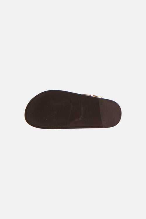 Bruine sandalen van SUPERTRASH, van onderaf gezien, met merknaam en maat 40 op de zool.