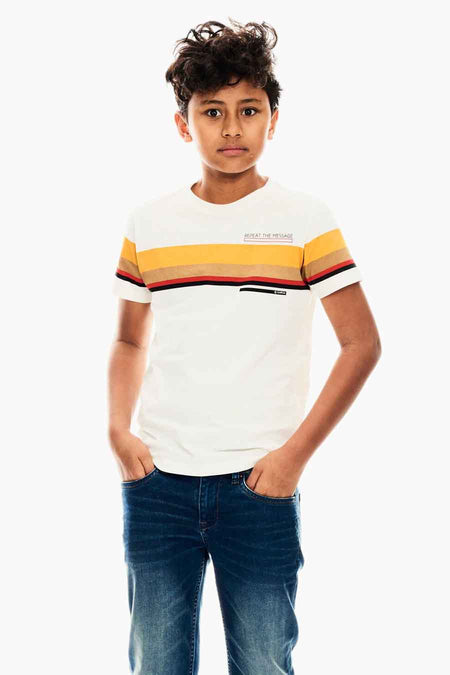 White long-sleeve t-shirt with yellow and beige stripes, worn by a boy in blue jeans, front view.