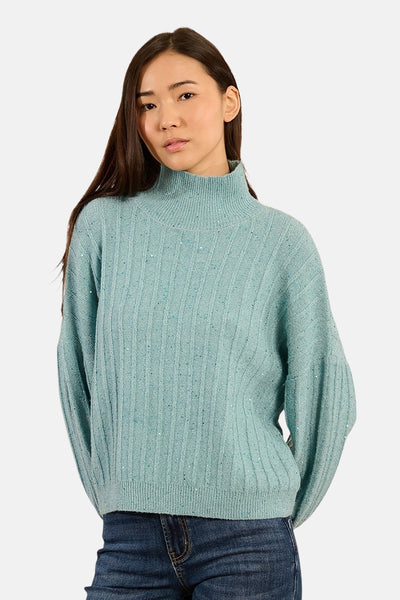 Pull à col roulé bleu de Molly Bracken avec texture côtelée et détails pailletés.