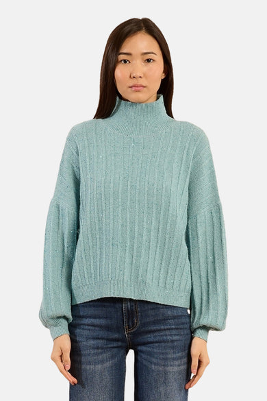 Molly Bracken blauwe coltrui met ribtextuur en subtiele glitterdetails.