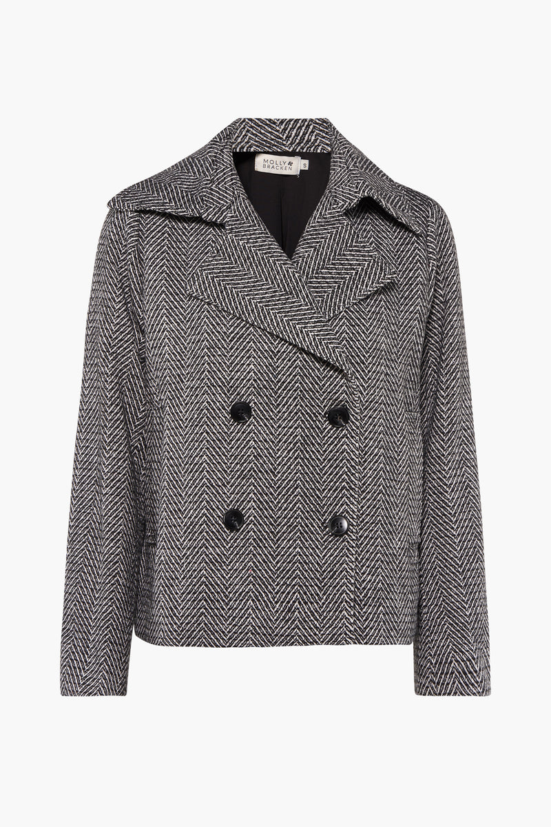 Veste courte noire par Molly Bracken, à motif chevrons, coupe croisée et boutonnée.