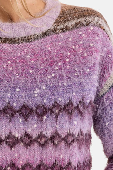 Multicolored fuzzy knit O-neck sweater with purple and brown stripes, white speckles, and zigzag pattern, close-up front view