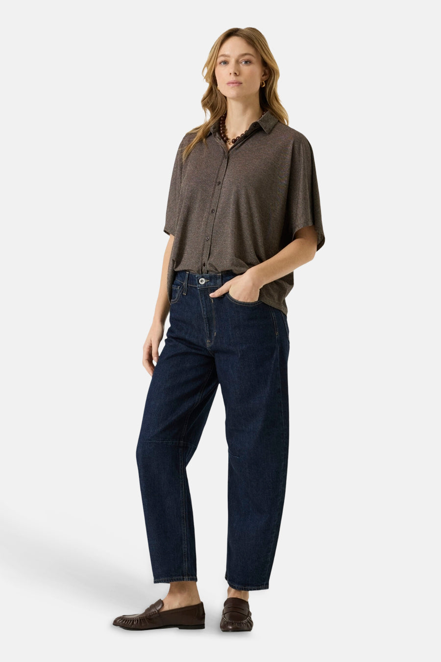 Brown 3/4 sleeve blouse with button front and relaxed fit, worn with dark blue jeans and brown loafers, full-length lifestyle view