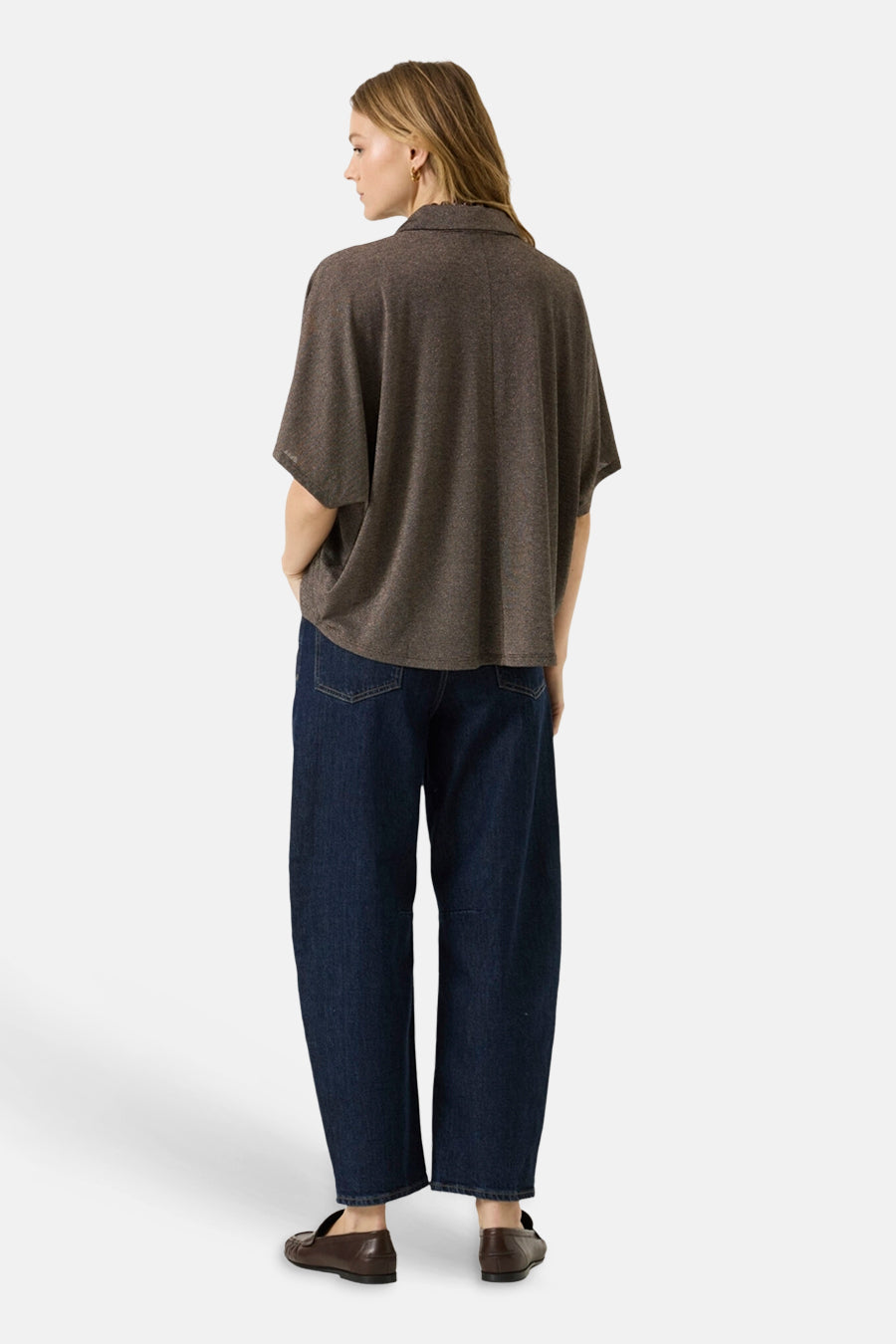 Brown 3/4 sleeve blouse with textured fabric, back view, worn with dark jeans and brown loafers
