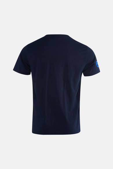 Navy blue short-sleeve t-shirt back view with bright blue number 6 patch on left sleeve