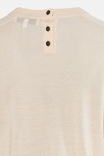 Pull écru de TERRE BLEUE avec fermeture à boutons au dos du col.