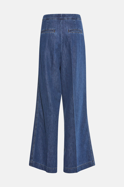 Pantalon large en denim bleu moyen de TERRE BLEUE, avec des poches arrière plaquées.