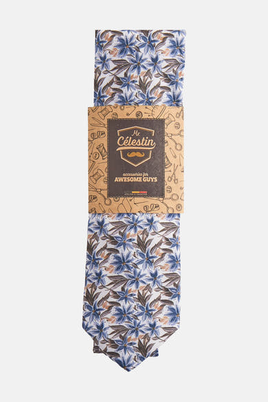 Multikleurige stropdas van MR. CELESTIN, met een blauw en bruin bloemenpatroon op een witte achtergrond.