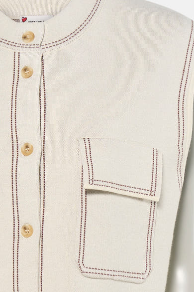 Ecru gilet van ADORE met contrasterende bruine randen, opgestikte zak en beige knopen.