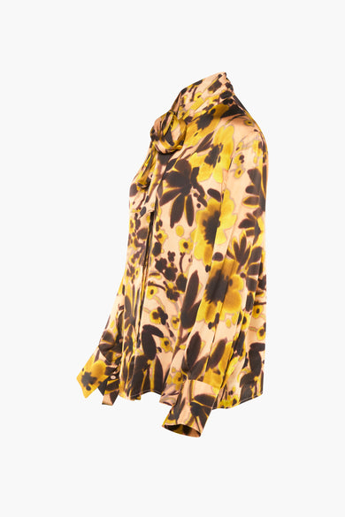 Chemisier à manches longues multicolore de VICOLO, avec motif floral et noeud au col.