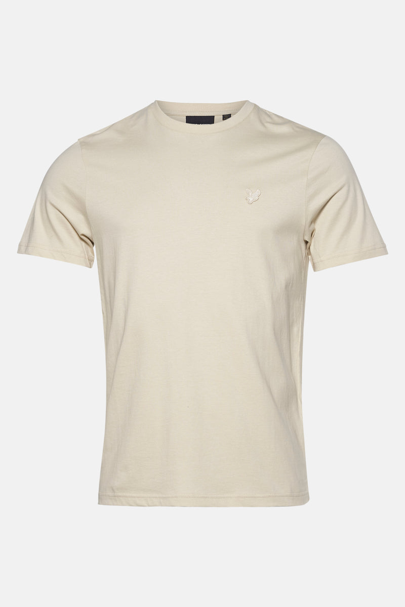 T-shirt beige à manches courtes de LYLE & SCOTT, avec un petit logo sur la poitrine.