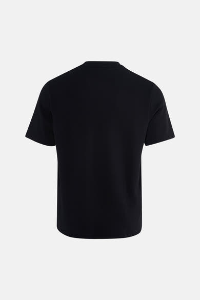 Black short-sleeve t-shirt back view, plain cotton fabric, simple round neckline, no visible logos or patterns.