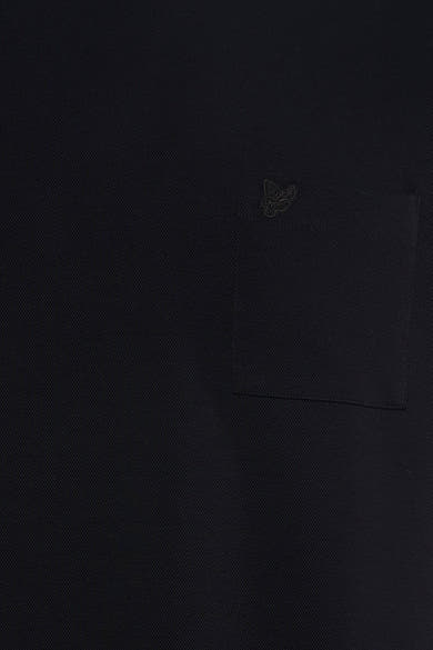 Black short-sleeve t-shirt with textured fabric and chest pocket featuring small embroidered logo, close-up view