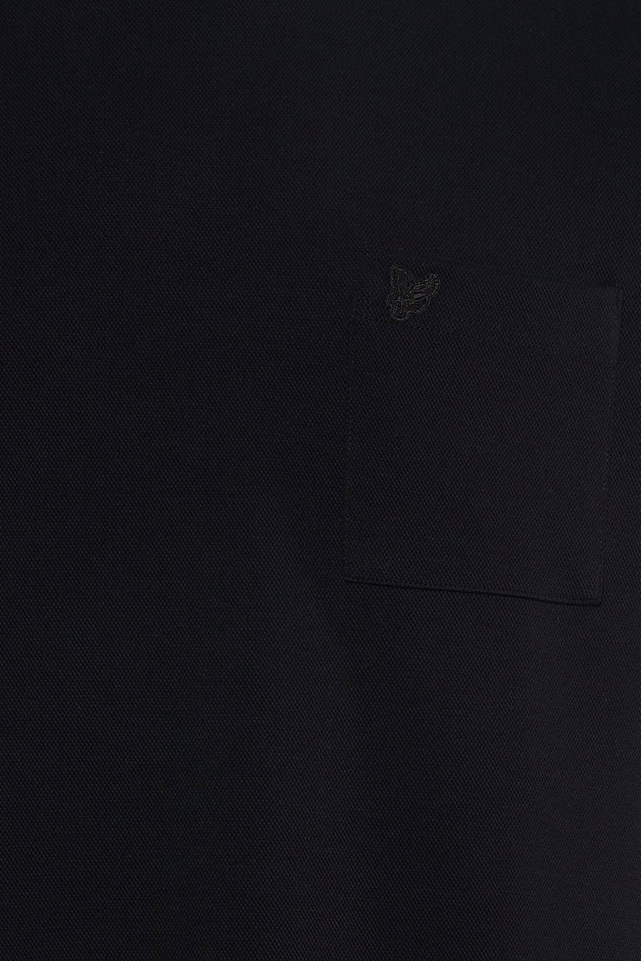 Black short-sleeve t-shirt with textured fabric and chest pocket featuring small embroidered logo, close-up view