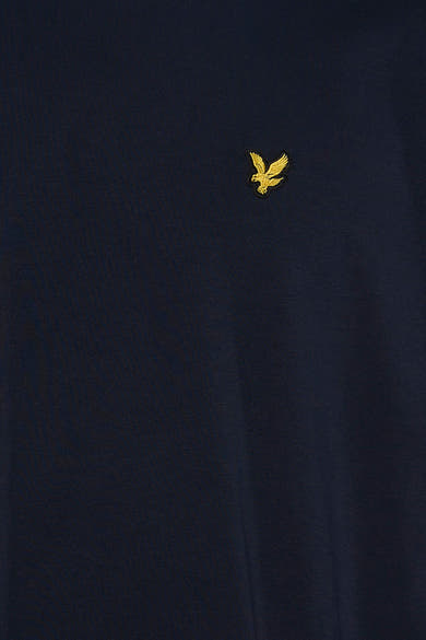 Navy long-sleeve t-shirt with gold embroidered eagle logo on chest, close-up view