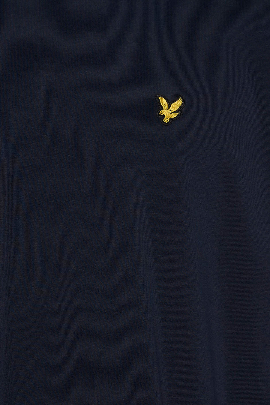 Navy long-sleeve t-shirt with gold embroidered eagle logo on chest, close-up view