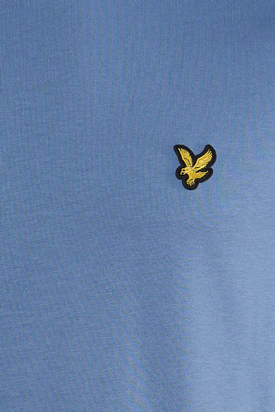 Blue short-sleeve t-shirt with golden eagle embroidery on chest, close-up view