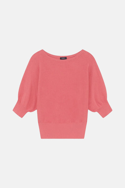Pull rose à col rond de CAROLL, avec manches bouffantes et finitions côtelées.