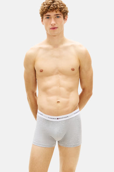 Boxer gris en jersey de Tommy Jeans, porté par un mannequin torse nu sur fond blanc.