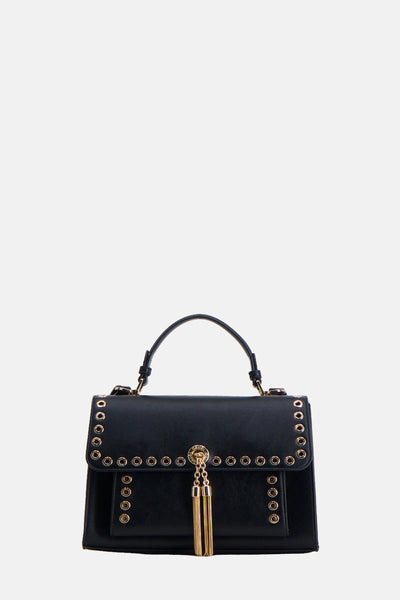 Sac à bandoulière noir de Gaudi Jeans avec des œillets dorés décoratifs et un pompon doré.
