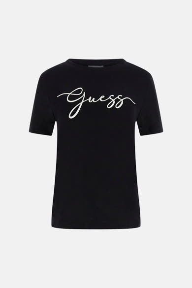 T-shirt noir à manches courtes de Guess avec le logo script blanc sur le devant.