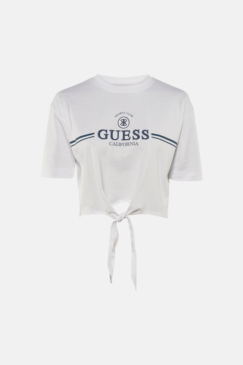 T-shirt à manches courtes blanc de Guess, avec logo bleu marine et détail noué sur le devant.