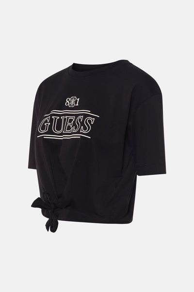 Zwart T-shirt met korte mouwen van Guess, met witte opdruk, aan de voorkant geknoopt.