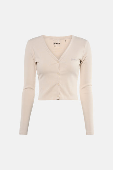 Ecru T-shirt met korte mouwen van Guess, gedragen met een vest en een wijde jeans.