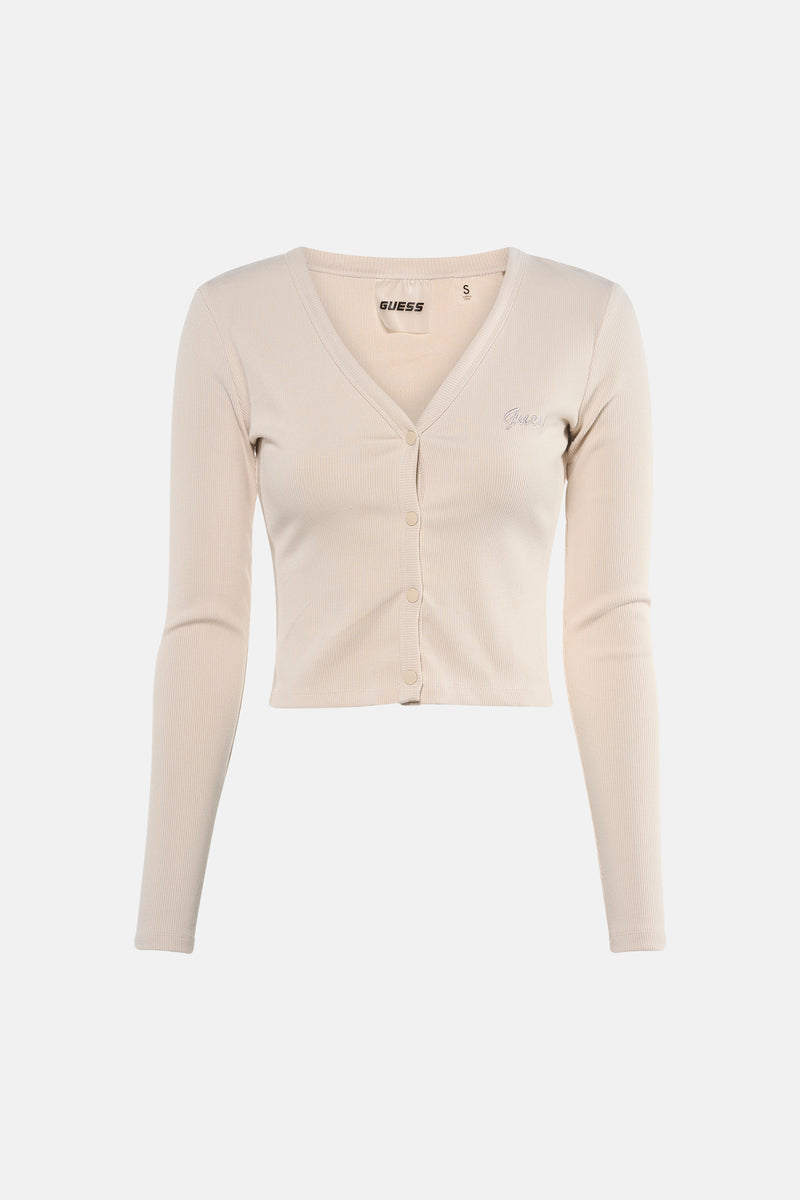 Ecru T-shirt met korte mouwen van Guess, gedragen met een vest en een wijde jeans.