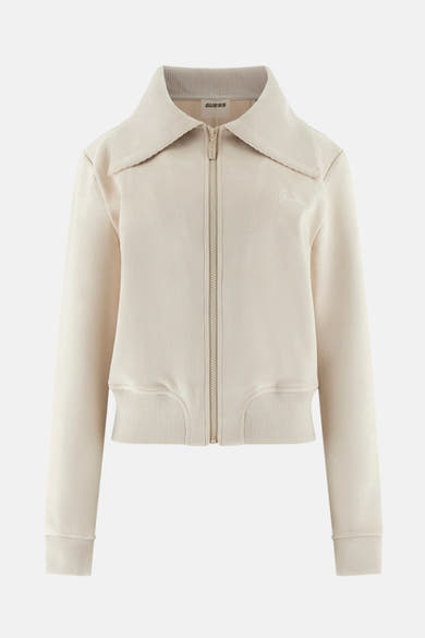 Cardigan beige par Guess, avec fermeture éclair sur le devant et col rabattu.