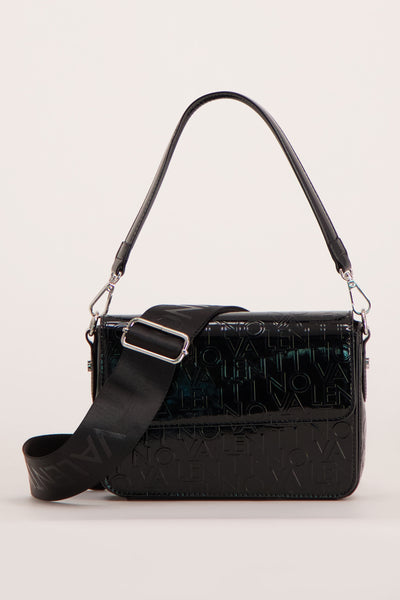 Black patent leather shoulder bag with embossed logo pattern and adjustable strap, front view