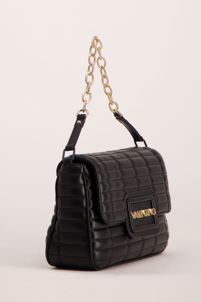 Black quilted leather shoulder bag by Valentino with gold-tone chain strap and front logo plaque, side view