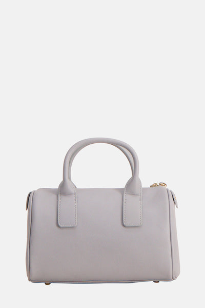 Sac à main bleu de VALENTINO BAGS avec anses arrondies et fermeture éclair dorée.