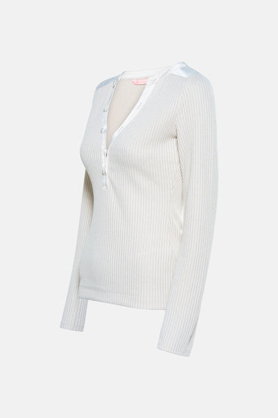Beige T-shirt met lange mouwen van Guess, in geribbelde stof met knoopsluiting en satijnen afwerkingen.