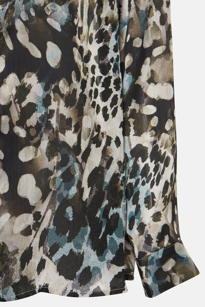 Chemisier à manches longues vert de Guess, à motif animalier et imprimé transparent.