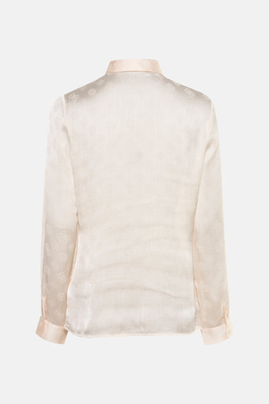 Beige blouse met lange mouwen van Guess, met subtiel patroon en licht satijnen textuur.