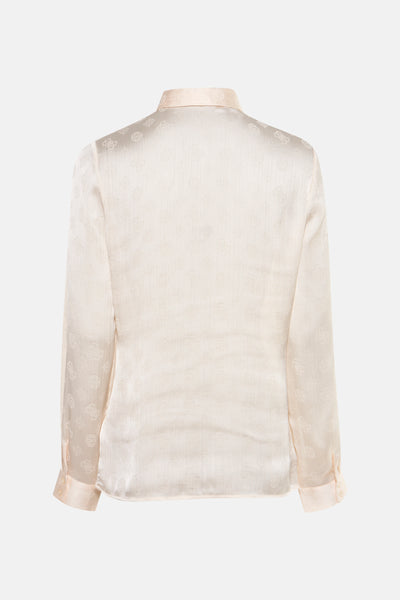 Beige blouse met lange mouwen van Guess, met subtiel patroon en licht satijnen textuur.