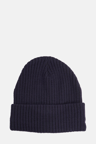 Bonnet bleu de DODI, en maille côtelée avec un revers large, présenté sur fond clair.