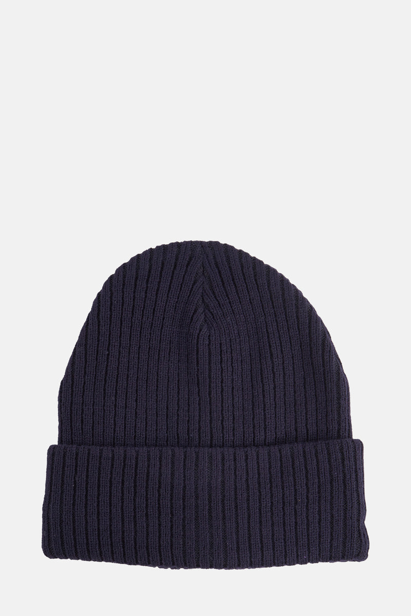 Bonnet bleu de DODI, en maille côtelée avec un revers large, présenté sur fond clair.