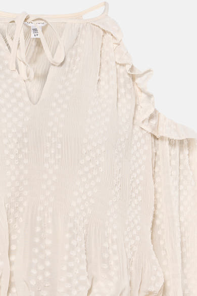 Ecru blouse met lange mouwen van Guess, met gestructureerde polkadots en ruches.