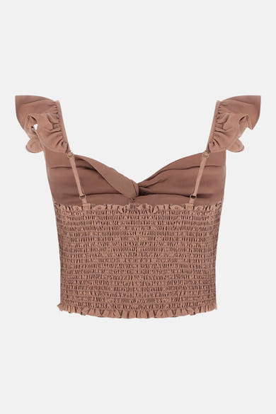 Débardeur rose Guess, à smocks et bretelles fines, agrémenté de volants aux épaules.