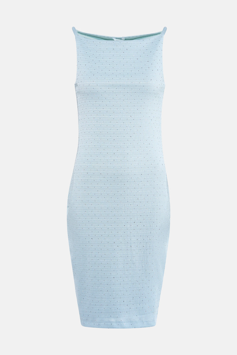 Robe verte moulante de Guess, ornée de petits points brillants sur toute la surface texturée.