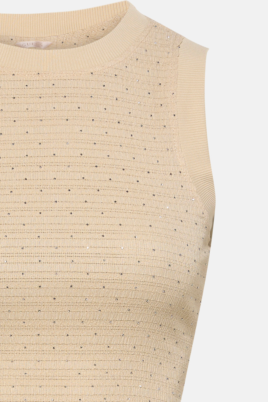 Top beige sans manches de Guess, orné de petits détails brillants.