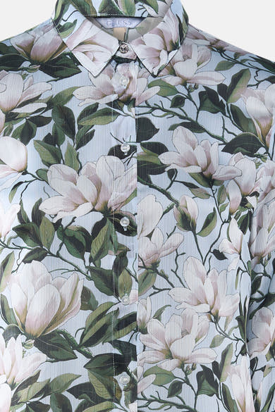Multikleuren blouse met lange mouwen van Guess, versierd met een bloemenpatroon van magnolia's en parelmoeren knopen.