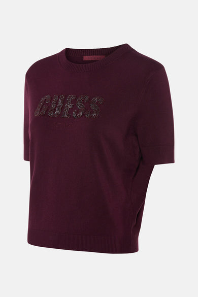 Bordeaux rondehals trui van Guess versierd met een strass-logo op de voorkant.