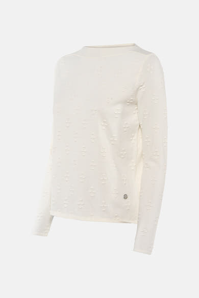 Pull écru à col rond de ZABAIONE, avec motif texturé en relief et logo discret sur le bas.