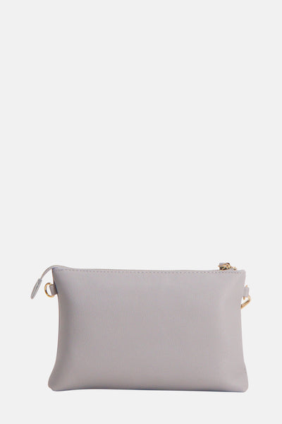 Sac à bandoulière bleu de VALENTINO BAGS, avec fermeture éclair dorée et détails métalliques.